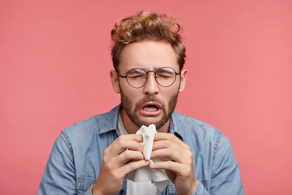 Man sneezing
